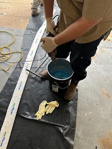 Plumber in Canyon Creek Richardson inspecting an aging cast iron sewer line with a camera